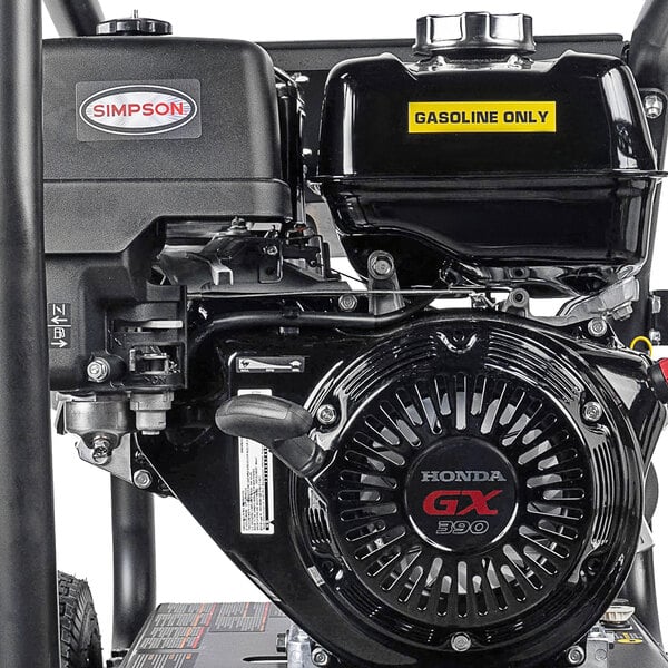 A close up of a black Honda gasoline engine.