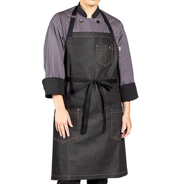 a person wearing a black apron