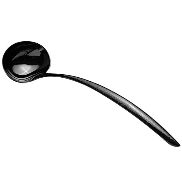 a black ladle with a long handle