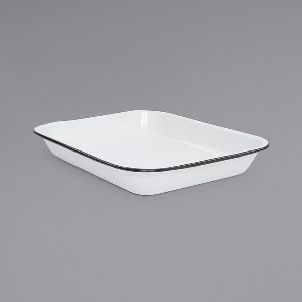 A white rectangular pan with black rim.