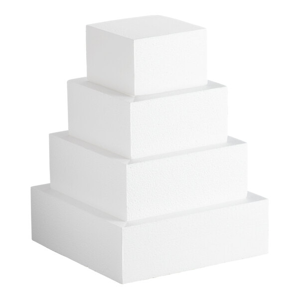 A four-tiered square white foam cake dummy kit.