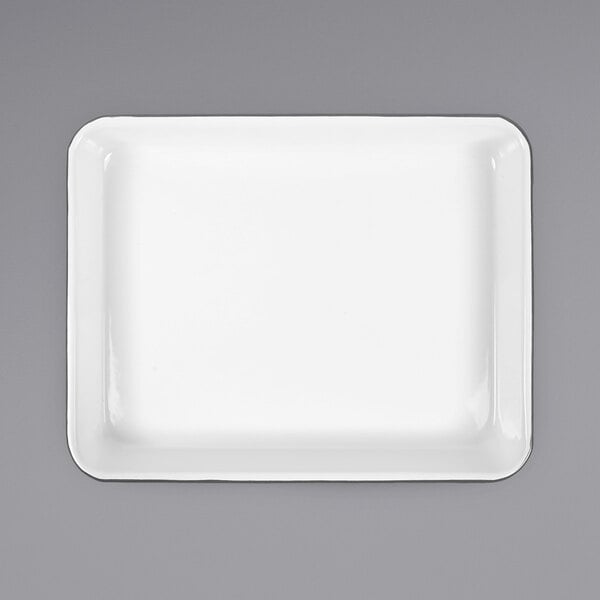 A white rectangular Crow Canyon Home enamelware tray with a grey edge.