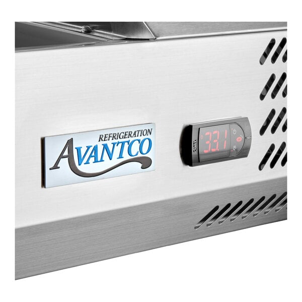 A stainless steel Avantco countertop refrigerated prep rail with a digital temperature display and sneeze guard.