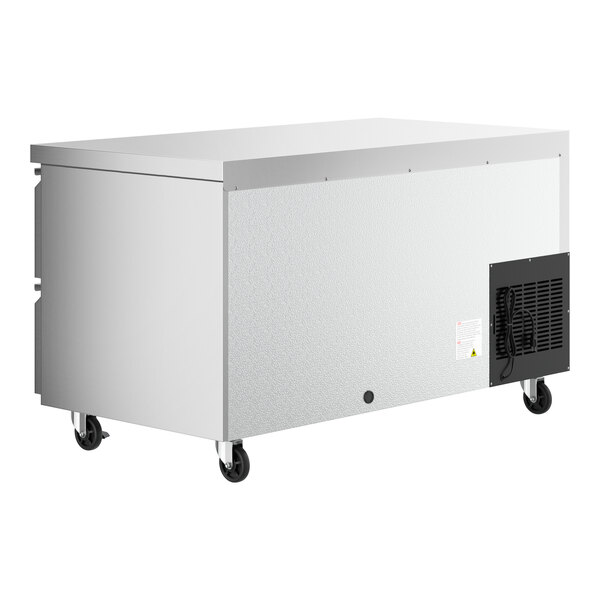 An Avantco stainless steel undercounter refrigerator with four drawers on wheels.