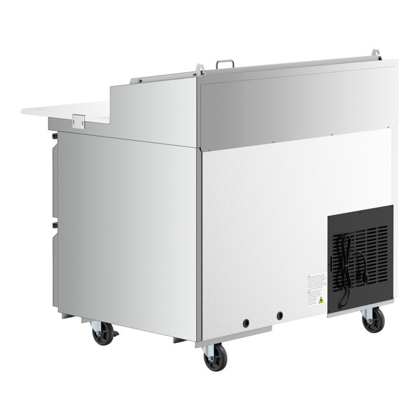 An Avantco stainless steel refrigerator with wheels.
