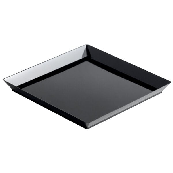 A Solia black plastic square plate with a black border.