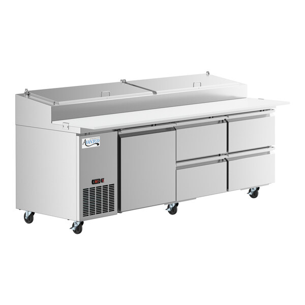 An Avantco stainless steel refrigerated pizza prep table with drawers on wheels.