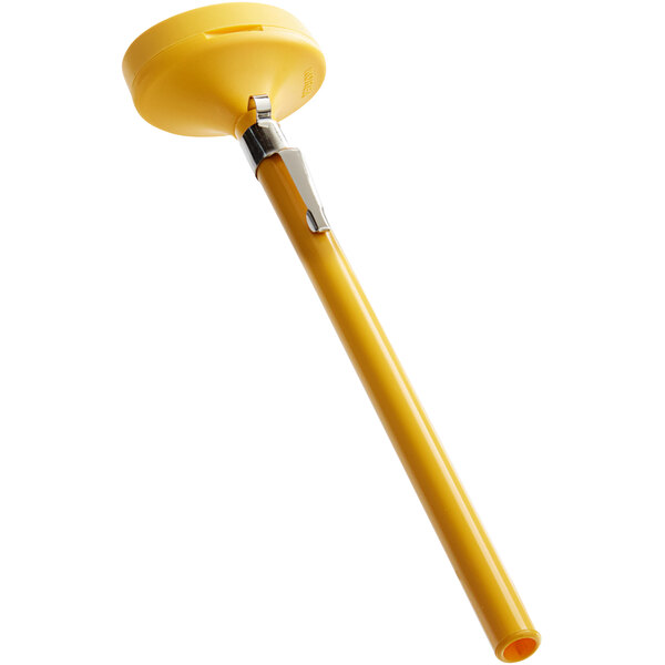 A yellow Comark digital pocket probe thermometer with a metal holder.