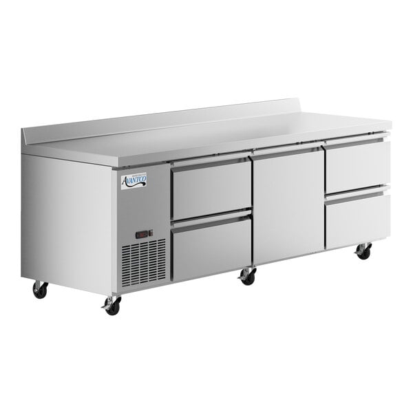 An Avantco stainless steel worktop refrigerator with 3 drawers and 1 door on wheels.