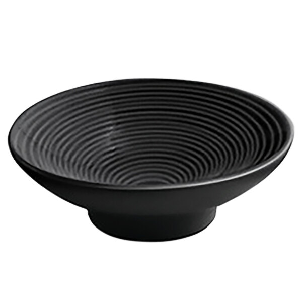 A semi-matte black porcelain ramekin with spiral lines.