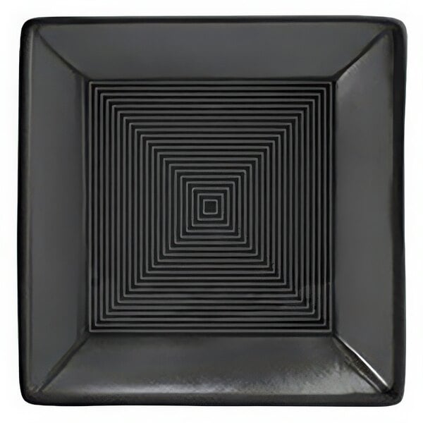 A black square porcelain bowl with a spiral square pattern.