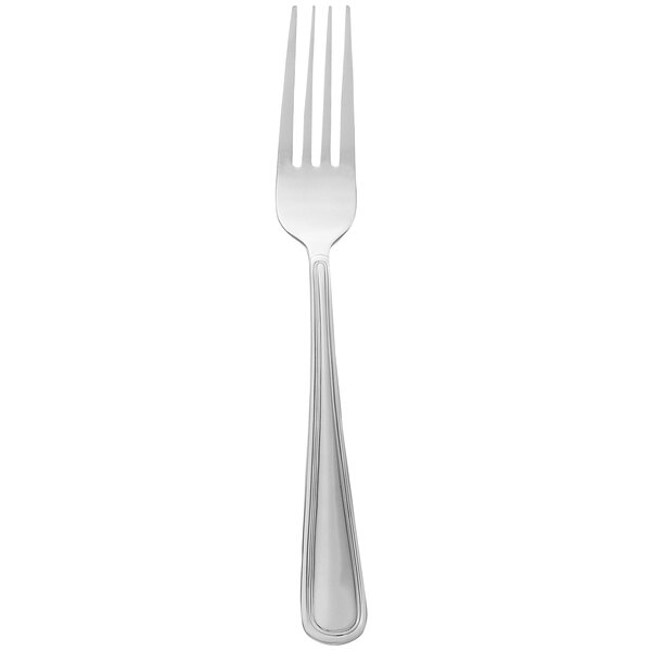 A Libbey stainless steel dinner fork with a silver handle.