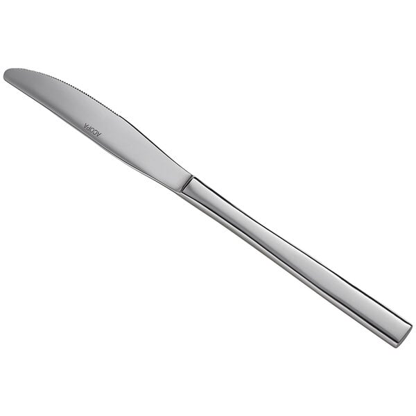 An Acopa Phoenix stainless steel dinner knife with a long silver handle.