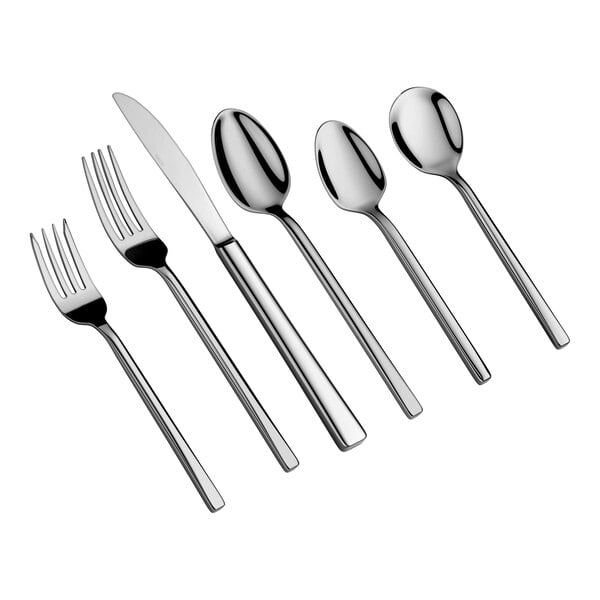 Six pieces of shiny, stainless steel cutlery including two forks, one knife, and three spoons are arranged side by side on a white background.