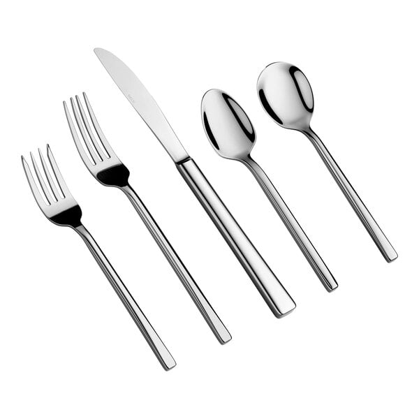 Five pieces of shiny, stainless steel flatware including two forks, a knife, and two spoons, arranged side by side on a white background.