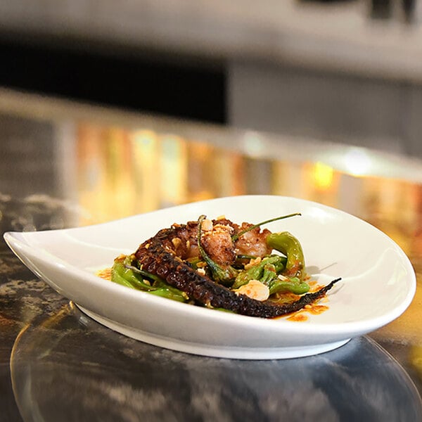 a plate of food on a marble table