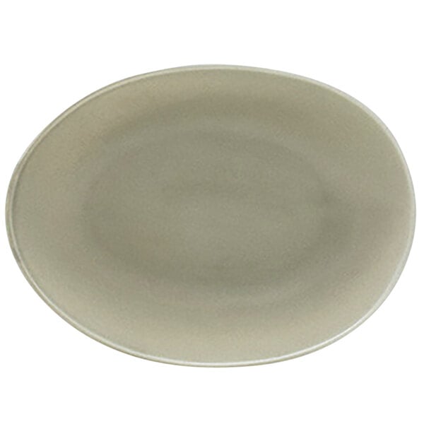 A Front of the House Tides semi-matte pumice oval porcelain bowl with a white background.