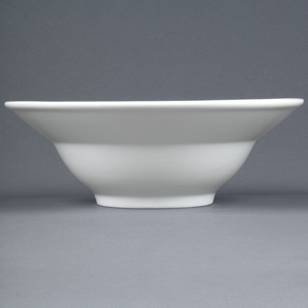 A white CAC porcelain mixing bowl with a small rim.