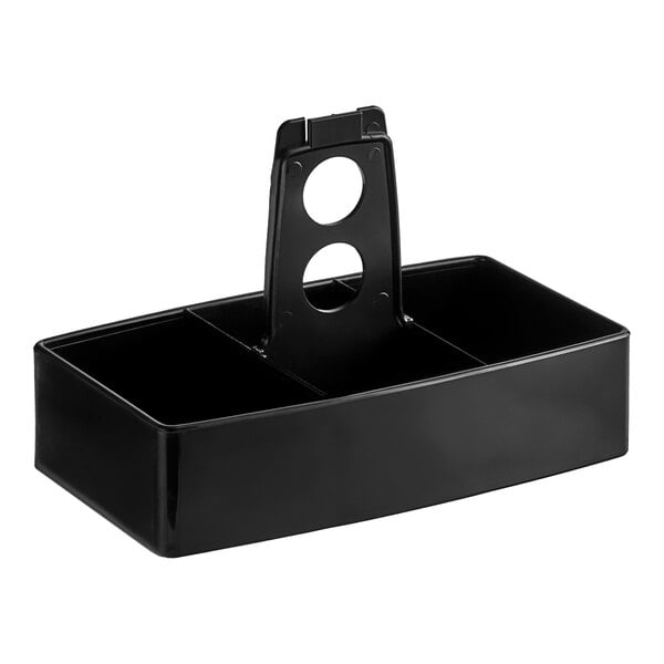 A black plastic Carlisle condiment caddy with two compartments and a handle.