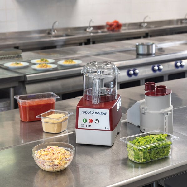 Robot Coupe R2NCLR Combination Food Processor with 3 Qt. / 3 Liter Clear Bowl, Continuous Feed & 2 Discs - 1 hp