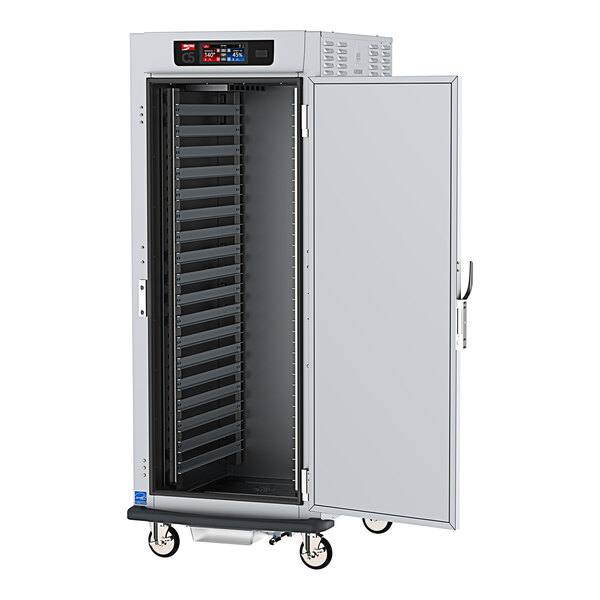 A large metal Metro C5 holding cabinet with a solid door and wheels.