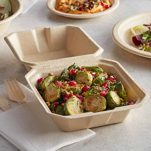 Green salad in a eco-friendly clamshell container