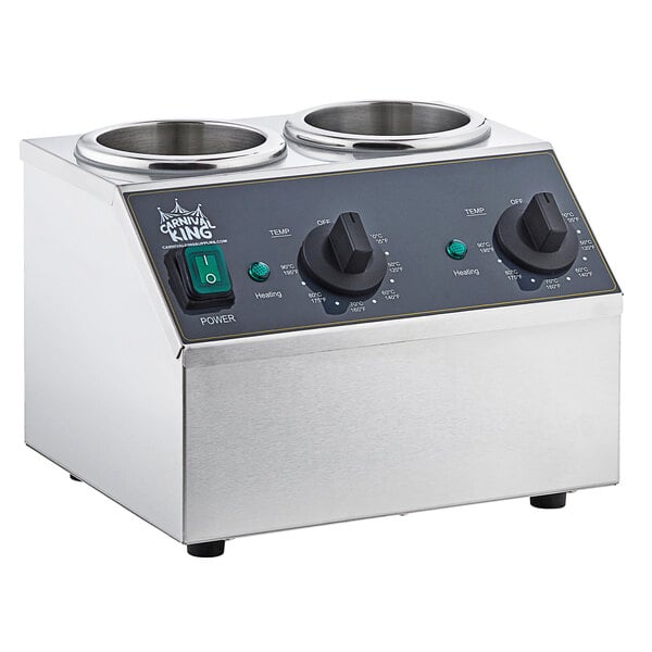 A silver and black stainless steel Carnival King sauce topping bottle warmer with two bowls on a counter.
