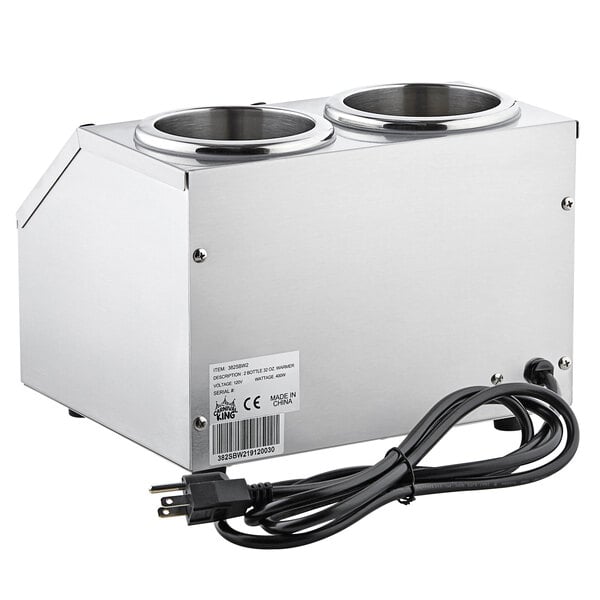 A silver rectangular Carnival King sauce warmer with two cups.