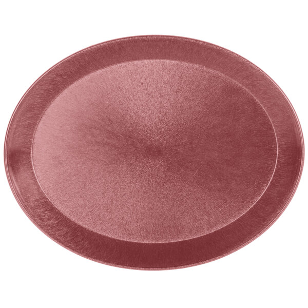 An 11" red oval polypropylene deli server from HS Inc. on a table.