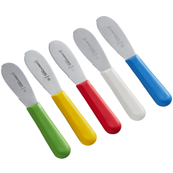 A Dexter-Russell bucket of 48 scalloped sandwich spreaders with colorful handles.