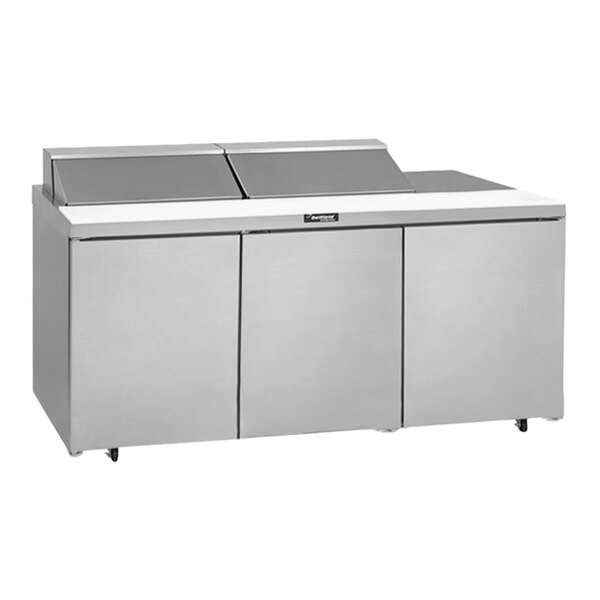 A Delfield stainless steel sandwich prep table with three doors.