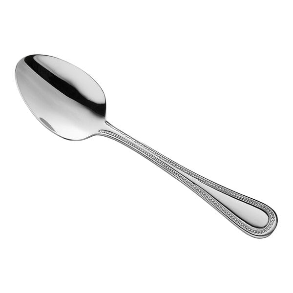 An Acopa Lydia stainless steel dinner/dessert spoon with a beaded design on the handle.