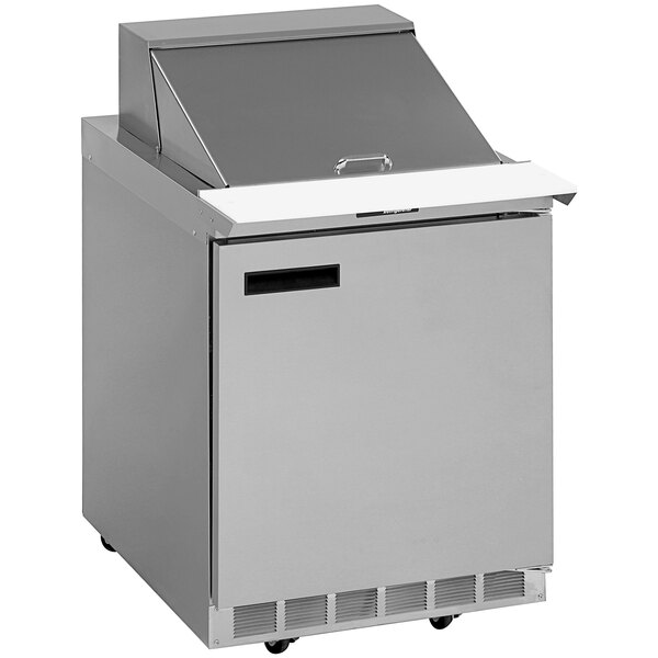 A silver Delfield refrigerator with a lid open on wheels.