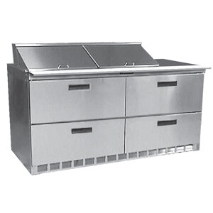 A stainless steel Delfield refrigerated sandwich prep table with four drawers.