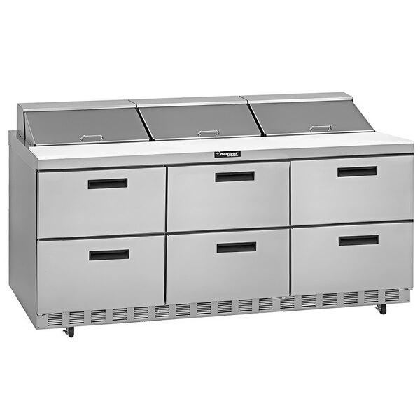 A Delfield reduced height refrigerated sandwich prep table with drawers.