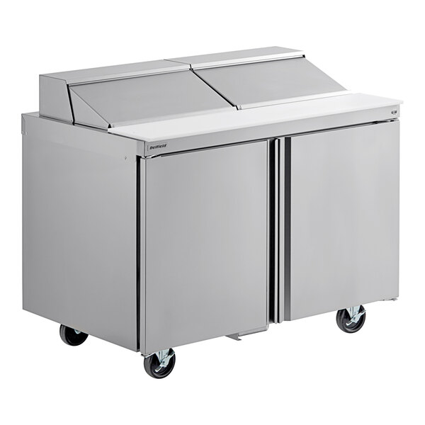 A stainless steel Delfield refrigerated sandwich prep table with two doors.