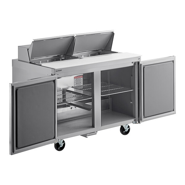 A stainless steel Delfield sandwich prep table with two doors.