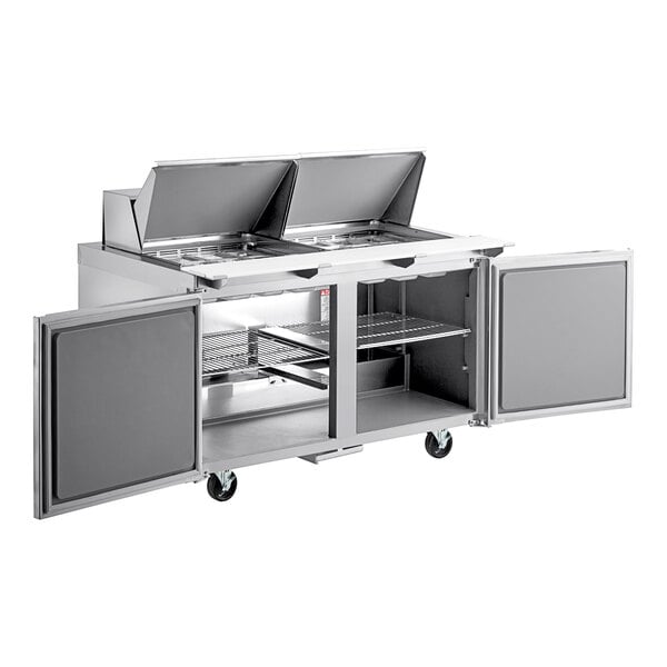 A stainless steel Delfield sandwich prep table with two doors.