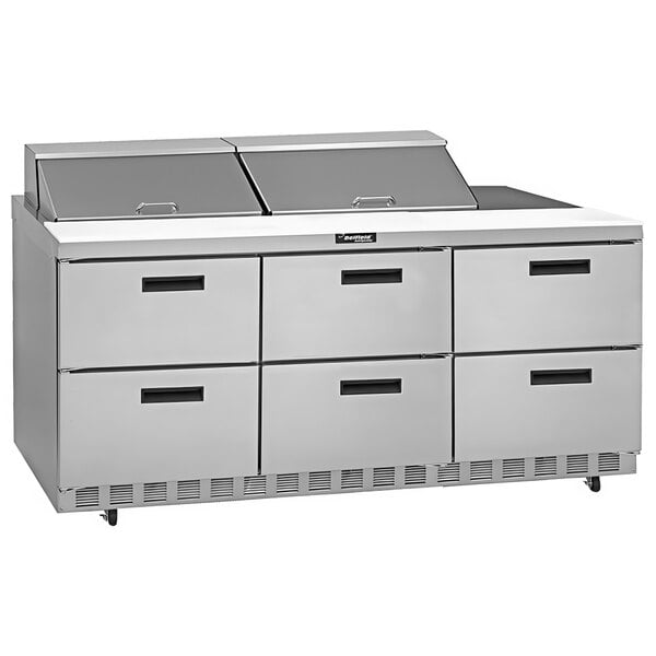 A Delfield commercial sandwich prep table with drawers on a counter.