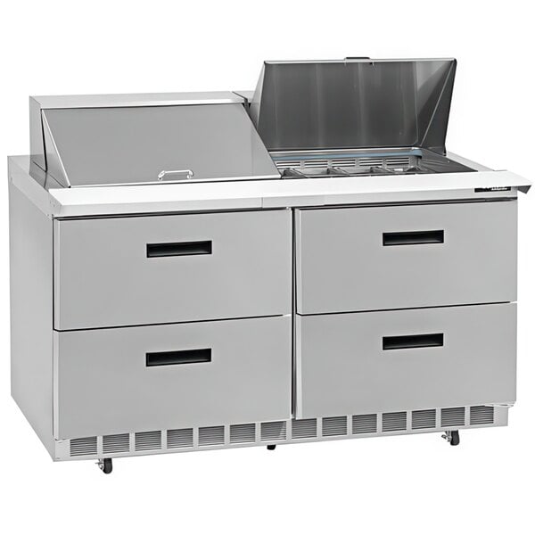 A Delfield stainless steel refrigerated sandwich prep table with drawers.