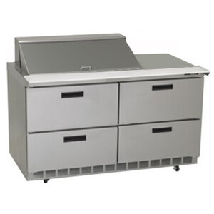 A stainless steel Delfield ADA height refrigerator with 4 drawers.