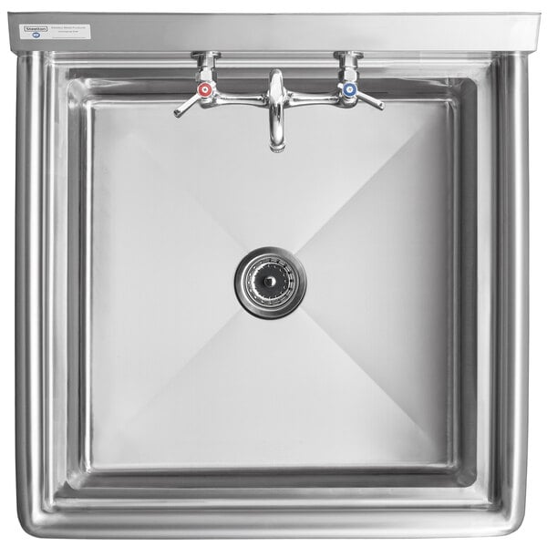 A Steelton stainless steel commercial sink with a faucet.