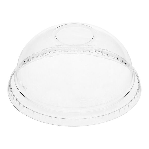 A Dart clear plastic dome lid for a cup.