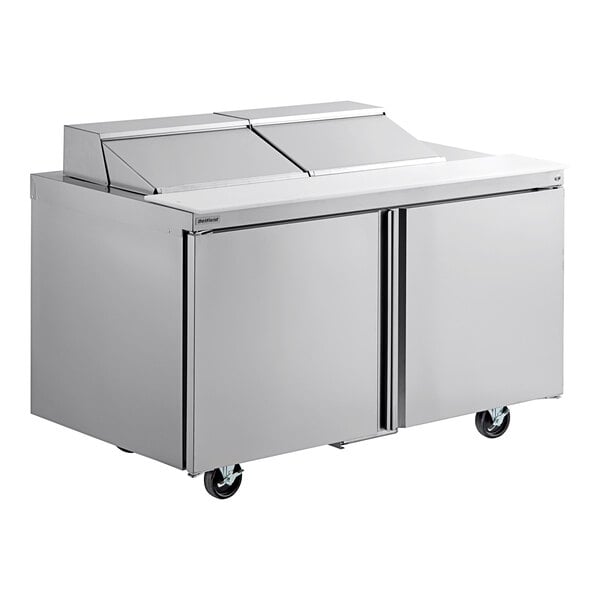 A Delfield stainless steel sandwich prep table with two doors.