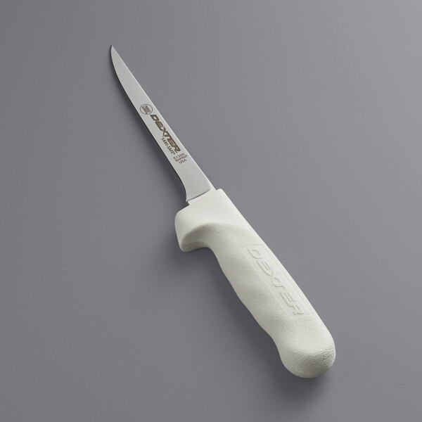 A Dexter-Russell narrow boning knife with a white handle.