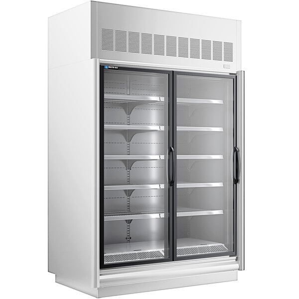 A white Master-Bilt glass door merchandiser freezer with two doors open.