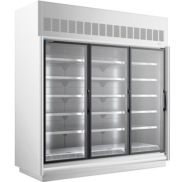 A white Master-Bilt glass door merchandiser freezer with three open doors.