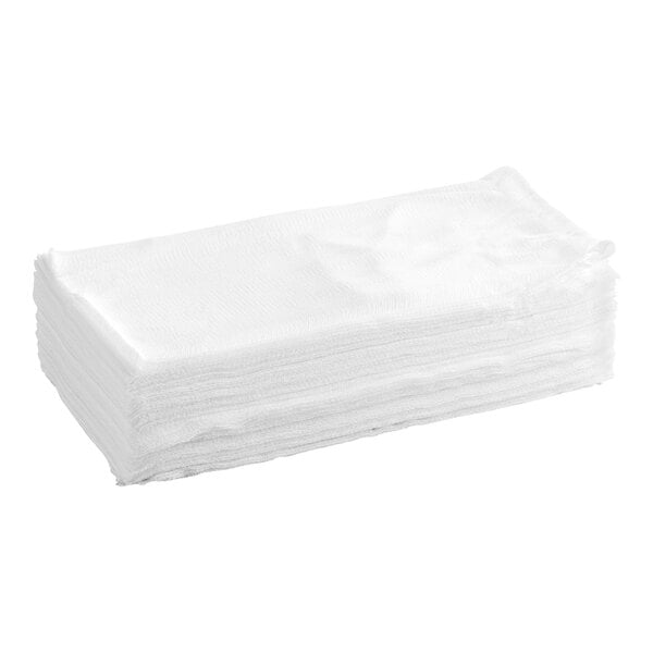 A stack of folded white cloth sheets, likely cheesecloth, displayed on a white background.