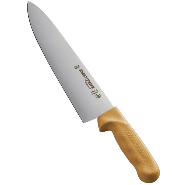 a knife with a yellow handle