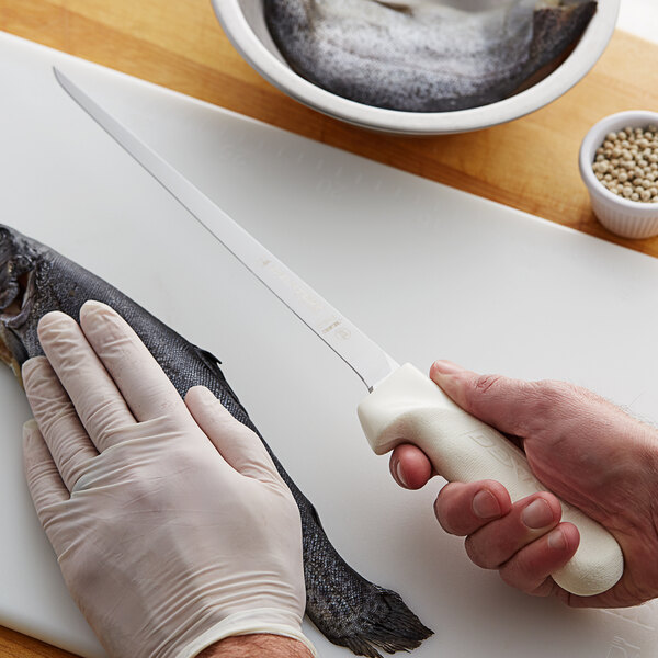 a person holding a white object